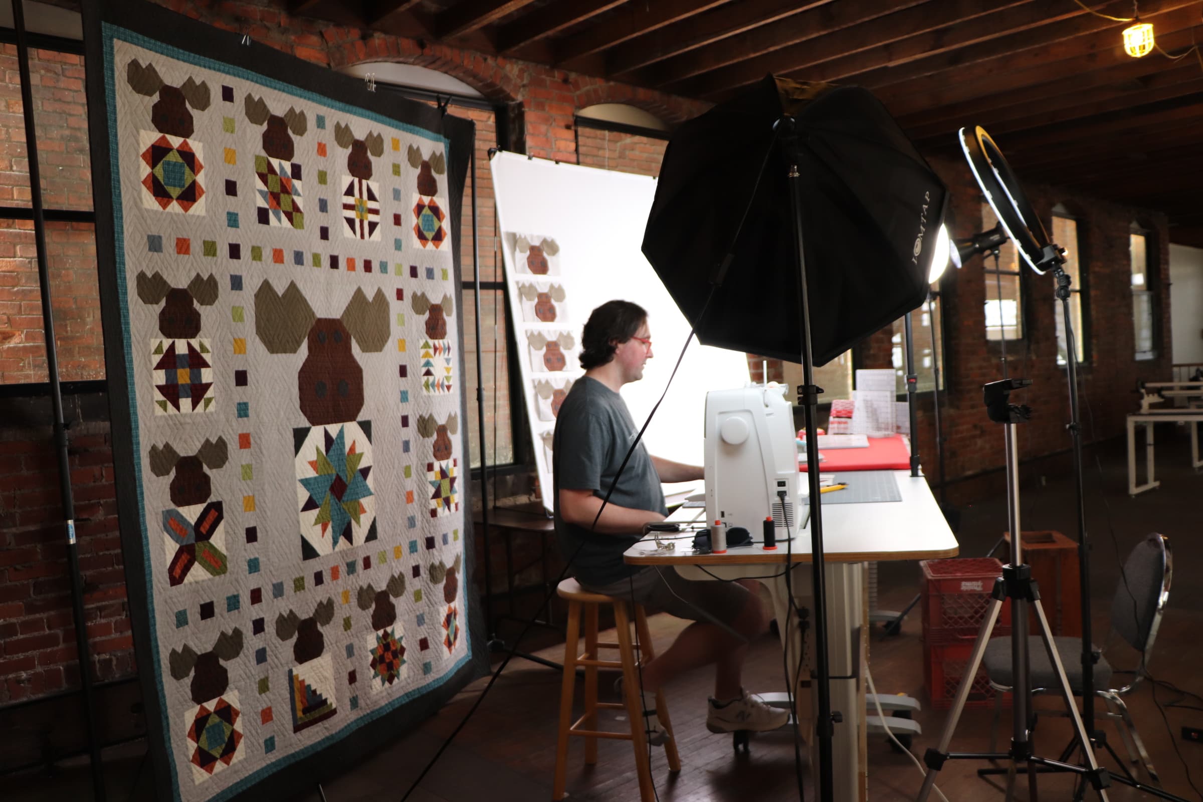 Image of designer filming behind the scenes